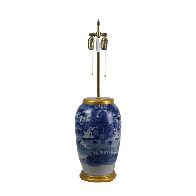 Chinese antique blue and white vase table lamp in the middle of the 19th century.The vase depicts an ancient Chinese story...