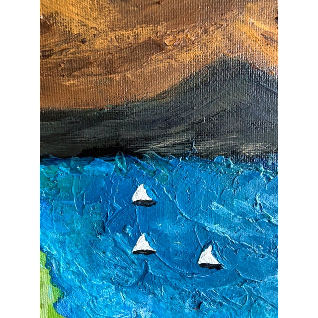 Original painting by L. Romo featuring a colorful lakeside village beneath warm brown mountains and a swirling, heavily...