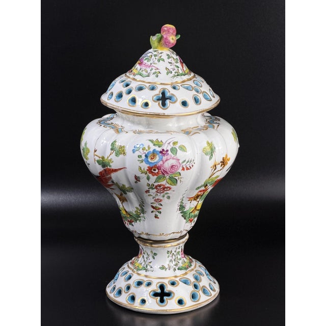 A finely crafted late 19th century porcelain covered vase produced by the renowned Samson manufactory in Paris. The piece...
