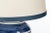 This nautical navy table lamp speaks to a new level of class with its artistic brushstroke details and vertical stripes....