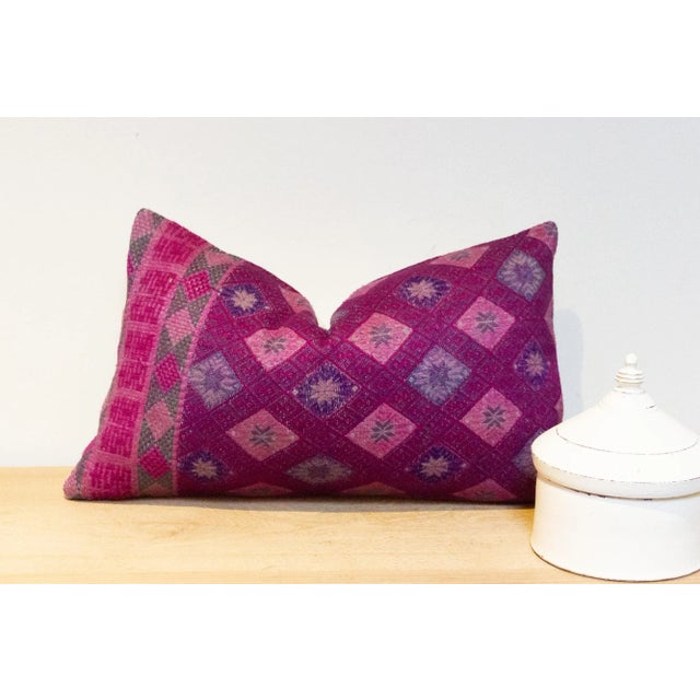 Magnificent lumbar pillow made from a wonderful batik Hmong fabric. Pillow have a center strip of rich Indigo textile...