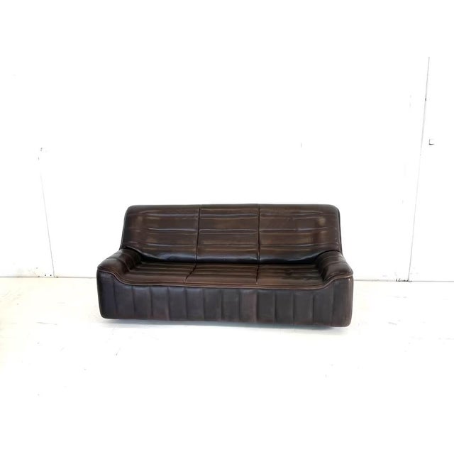 2 De Sede DS-84 Buffalo Leather Sofas Designer: De Sede Design Team Manufacturer: De Sede Model: DS 84 Color: Dark brown...
