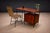 This pair of chairs reflects the Brazilian modernist interest in combining industrial structure with natural fiber. Each...