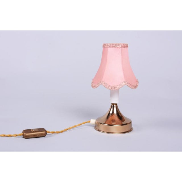 This charming table lamp dates back to the 1960s and was manufactured in Jablonec nad Nisou, a city with a rich tradition...