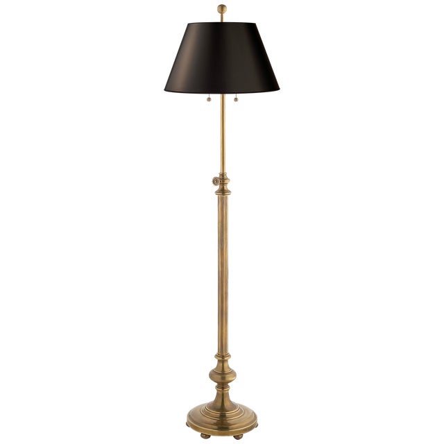 Overseas Adjustable Club Floor Lamp in Antique-Burnished Brass with Black Shade Designer: Chapman & Myers Height: 47" -...