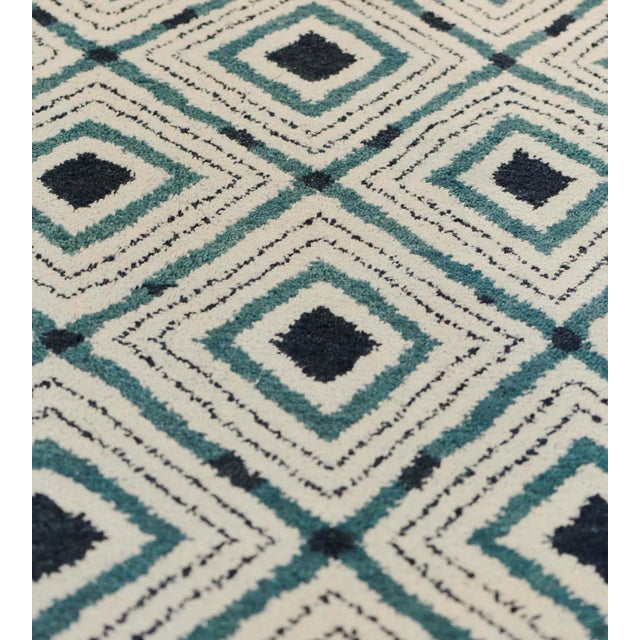 Part of the Mansour Modern collection, this wool rug is handwoven by master weavers using the highest quality techniques...