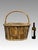 Appealing hand crafted oval shaped basket. The body of this sturdy basket is made with large split bamboo slats neatly put...