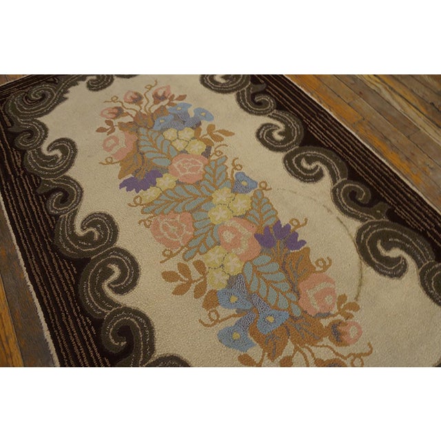 Antique American hooked rug 3'2" x 5'8". Antique American Hooked Rug American Floral, Medallion, Circa Date: 1940s. This...