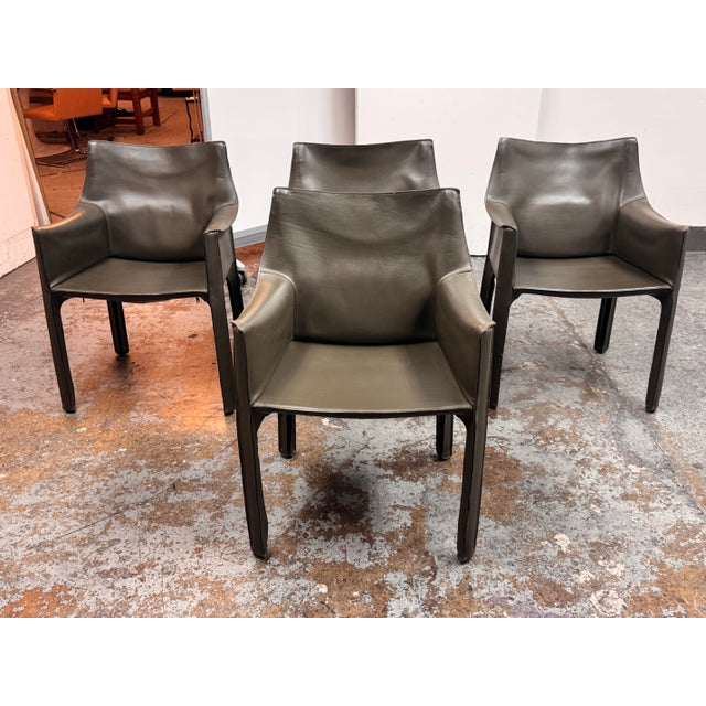 Design Plus Gallery presents a Set of Four CAB 413 Leather Armchairs by Mario Bellini for Cassina. Designed in 1977, the...