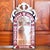 A small mirror with a lot of presence, the red "cut to clear" arched mirror frame is enhanced by a clear glass crest and...