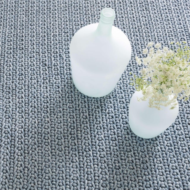 Look closely: the chunky texture and organic look of this rug is just like jute. But it's actually scrubbable, hoseable,...