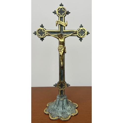A beautiful Vintage religious set featuring an elegant crucifix accompanied by two matching candleholders, all crafted in...