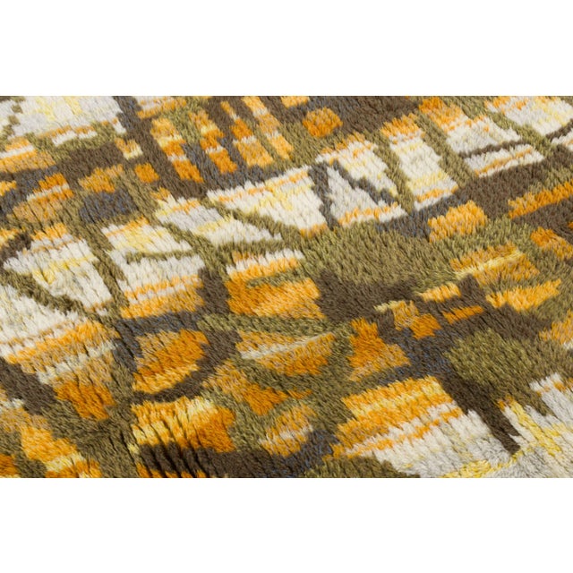 Hand-knotted in wool and originating circa 1950-1959, this 4x6 vintage Swedish rya rug joins Rug & Kilim’s Scandinavian...