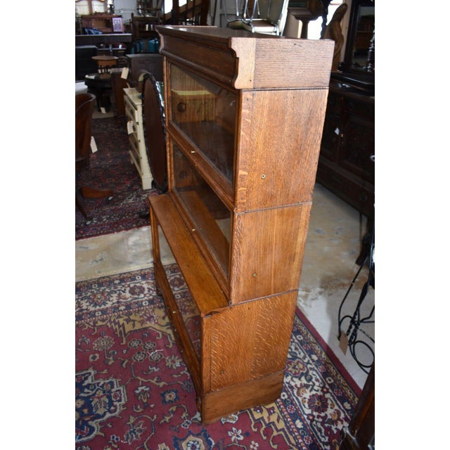 Gorgeous! Unique antique step back barrister (lawyer's) bookcase. Display cabinet, refinished in tiger stripe oak with...