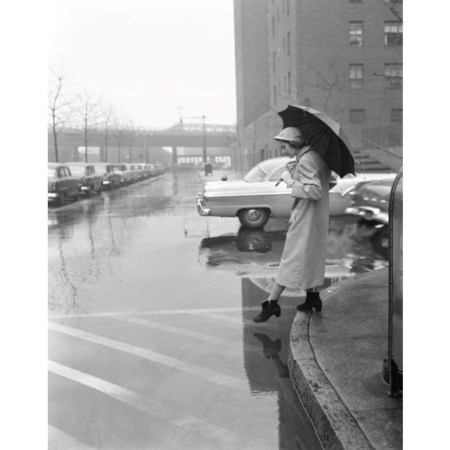 Woman in a rain coat (1955) silver gelatin fibre print - oversized (photo by h. Armstrong roberts/alamy) a woman in a...