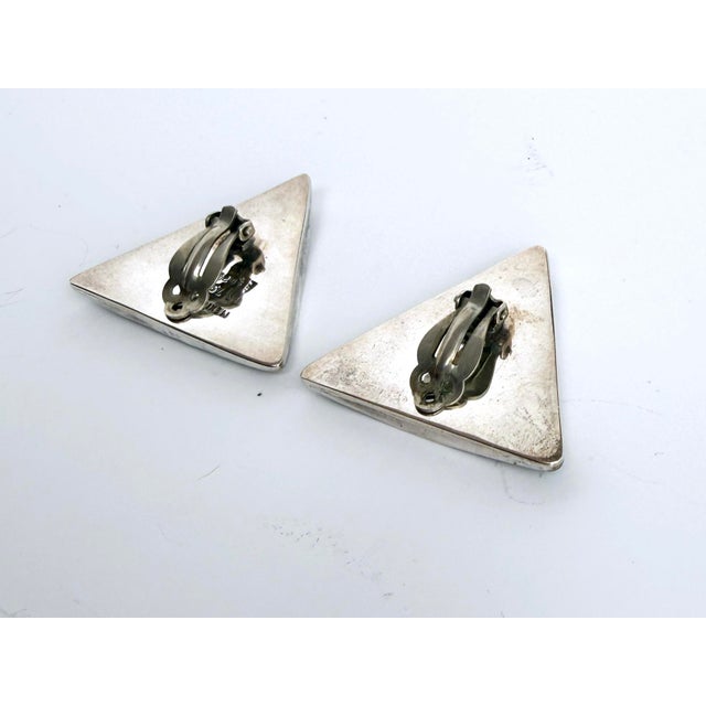 A stylish vintage pair of Mexican sterling silver statement earrings. Substantial sterling silver in a triangle shape, set...