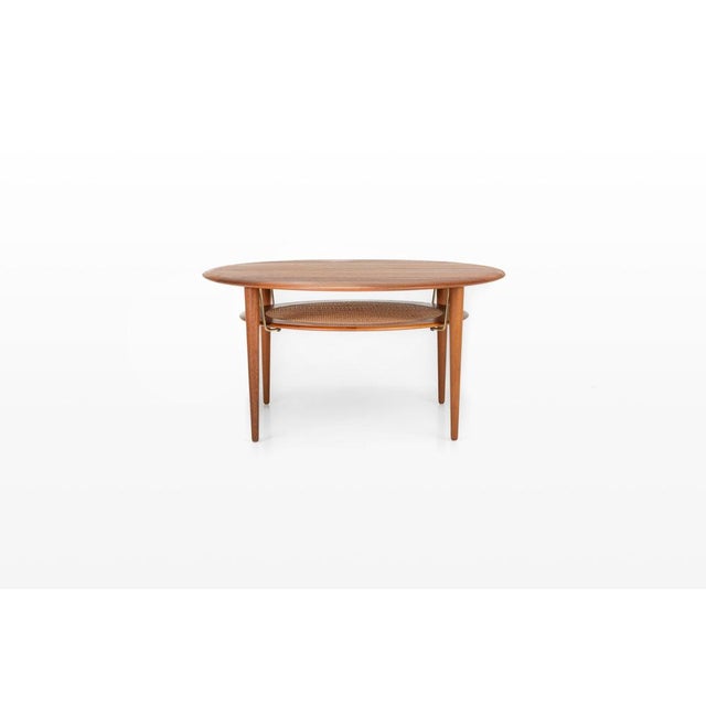 Beautiful round coffee table designed by Peter Hvidt & Orla Mølgaard Nielsen and manufactured by France & Son, Denmark,...
