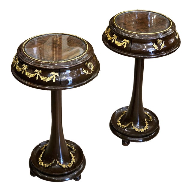 Set of 2 French Neoclassical Side Tables – Dark Wood, Glass Tops & Gold Leaf Details For Sale