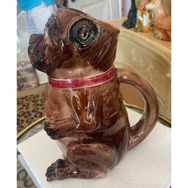 Just in! This majolica glazed jug or pitcher is of a Pug Dog, made in Staffordshire, England, late 19th century. These...