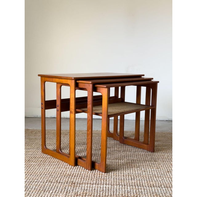 Teak Nest of Tables with Rattan Shelf by Johannes Andersen for Silkeborg, 1960s, Set of 3, in Very Good conditions....