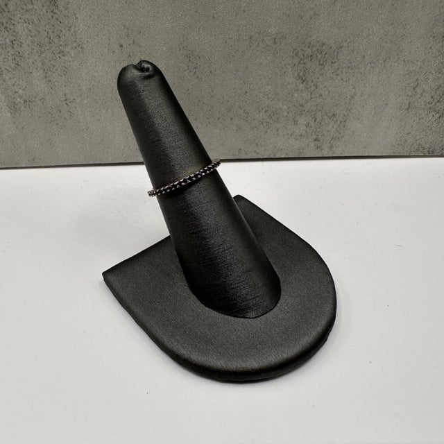 This stunning Blue Sapphire Eternity Ring in 14kt yellow gold features 1.25mm round blue sapphires, creating a vibrant and...