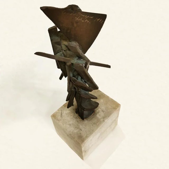 Guido Dragani| "Abstract"| h. cm.23x14 | bronze sculpture| marble base| total h. cm. 32,5x12,5x9,5| signed and dated 1975...