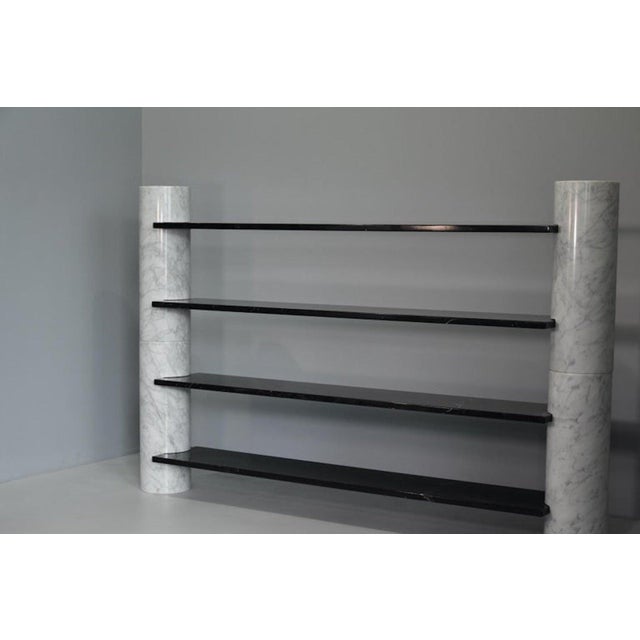 Rare bookcase by Angelo Mangiarotti in white Carrara marble and Marquita marble. The bookcase is part of the "Loico"...