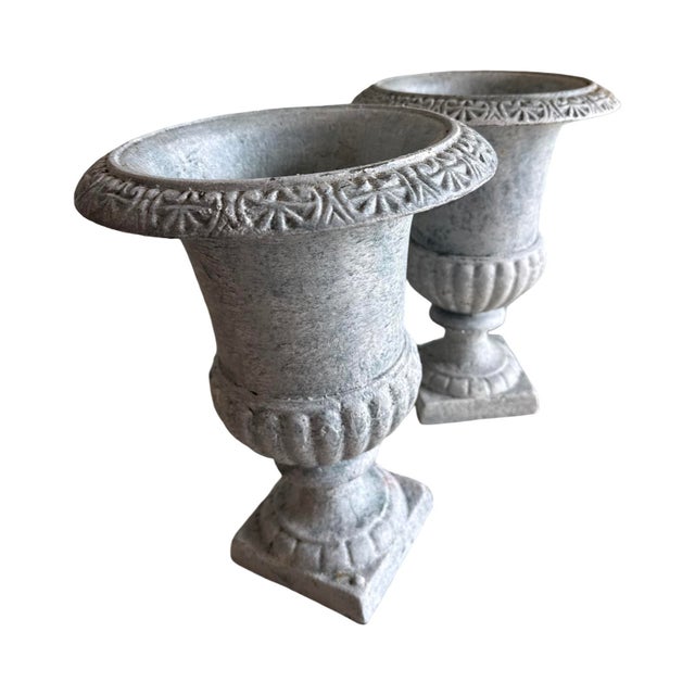Antique Italian Medici Style Urns in Cast Iron with old white patina .