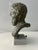 Plaster bust of Athenian philosopher Plato. Bust is erected by metal support atop a marble base. Piece looks like bronze...