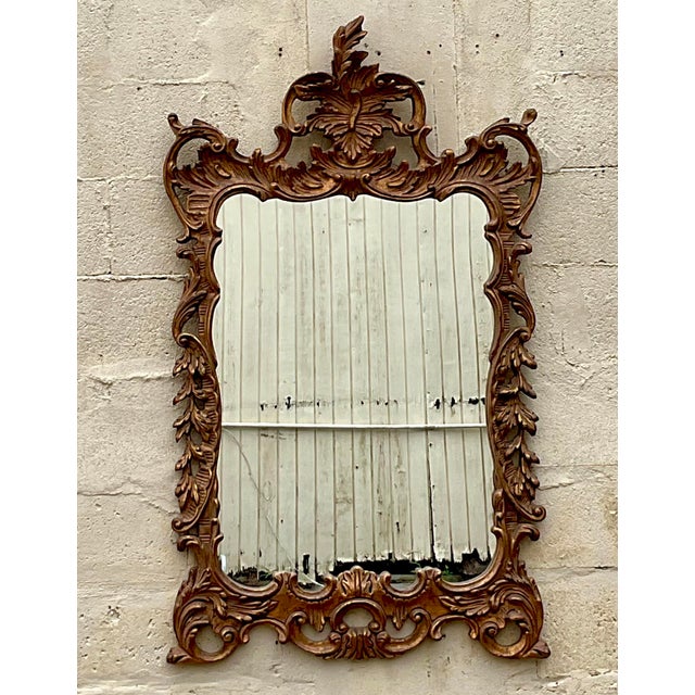 Add a touch of opulence to your space with this exquisite Vintage Regency Rococo Gilt Mirror. This stunning piece boasts...