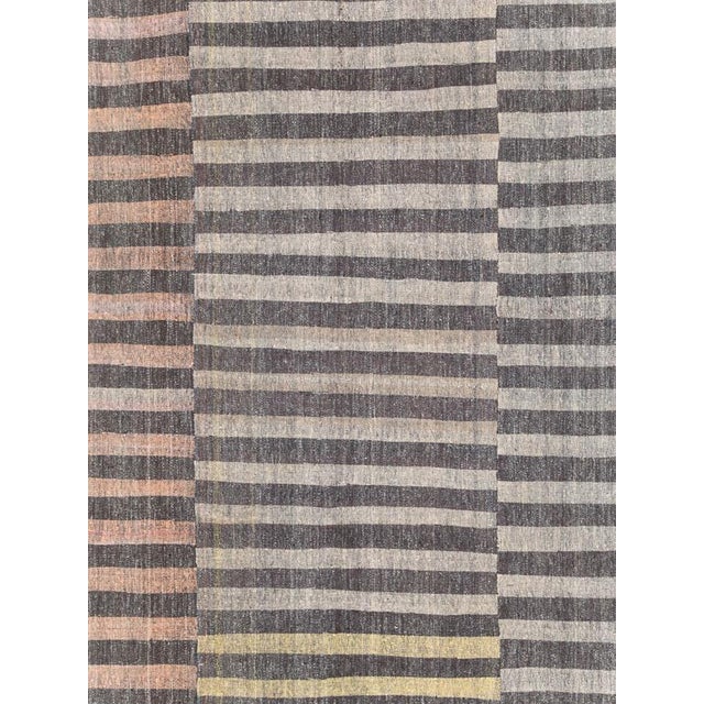 A vintage Turkish flatweave Kilim large oversize carpet handmade during the mid-20th century. Measures: 10' 8" x 22' 1".
