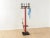 Postmodern coat stand from the 1980s.High-quality frame made of plastic with eight hooks and a cast iron base. Made in...