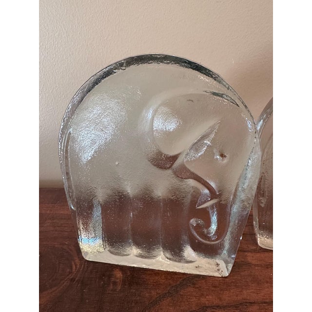 These two glass bookends are hand made and hand molded. They feature a three-dimensional elephant on the front with a...