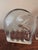 These two glass bookends are hand made and hand molded. They feature a three-dimensional elephant on the front with a...