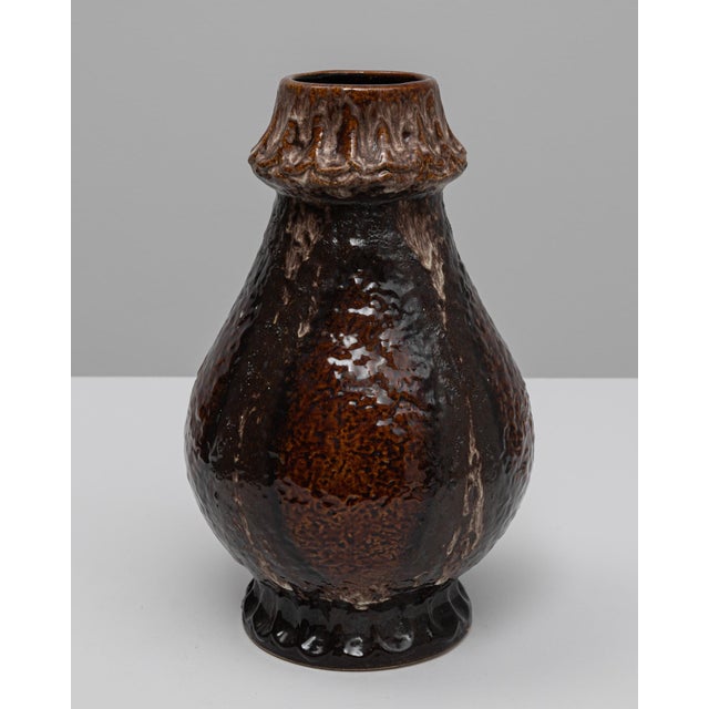 20th Century German W. Germany ceramic vase. This expressive mid-century vase showcases the bold, tactile design...