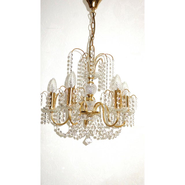 Vintage Brass and Lead Crystal Chandelier from Preico, 1980s, in Very Good conditions. Designed 1980 to 1989 This piece...