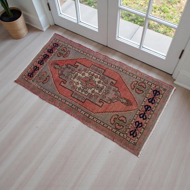 Vintage raw sienna (brilliant red-orange) color background rug perfect for a small area Dimensions: 21" x 41" or 1 ft 9 in...