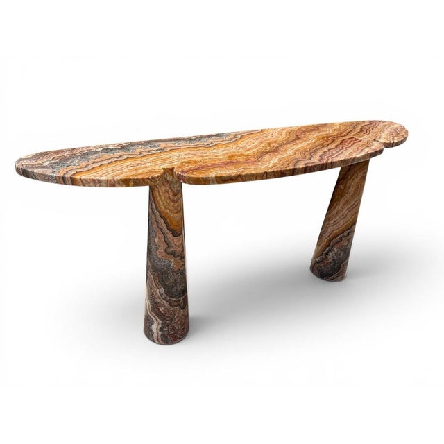 Striking Italian console table crafted entirely from granite during the 1980s. Characterized by its clean architectural...