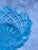 This is Kemple Tetec turquoise pressed glass in the star and fan pattern. It has a sawtooth edge and is typically used as...