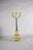 French 19th-century candelabrum in gilt bronze with a dark patinated, fluted metal column. Four curved figural arms...