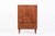 This vintage mid century Danish modern teak storage cabinet or bar cabinet was made in Denmark circa 1960. The classic...