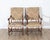 This handsome pair of Louis XIII style armchairs captures the bold character and traditional craftsmanship of 17th-century...