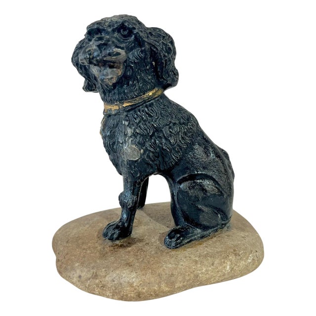 Antique French Lead Painted Black Spaniel Dog Seated on a Rock For Sale