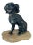 Antique French Lead Painted Black Spaniel Dog Seated on a Rock For Sale