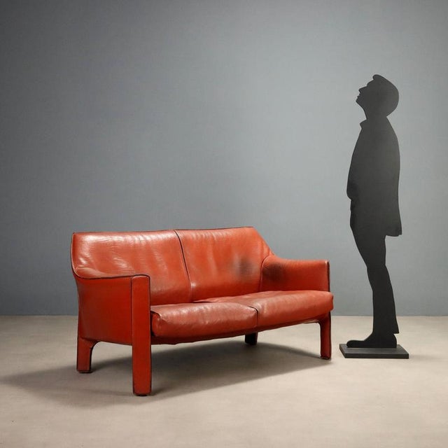 Two-seater leather sofa model CAB 415, designed by Mario Bellini for Cassina in the 1980s. This iconic piece features a...