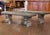 Substantial and beautifully weathered, this pair of early 20th century French garden benches offers sculptural form and...