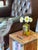 Mid-century hand blown glass apothecary jar in the style of vintage Empoli, Italy. Features a square-bodied form with a...