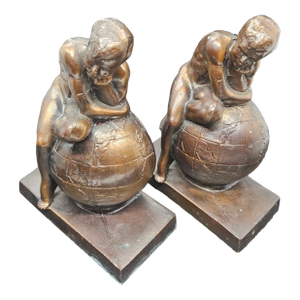 Vintage Atlas Inspired Man Resting on Globe Cast Metal Bookends Pair