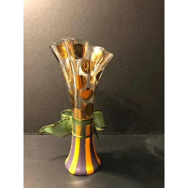 A beautiful vintage petite MacKenzie Childs green and gold vase. It retains the original green ribbon. Displays very well...