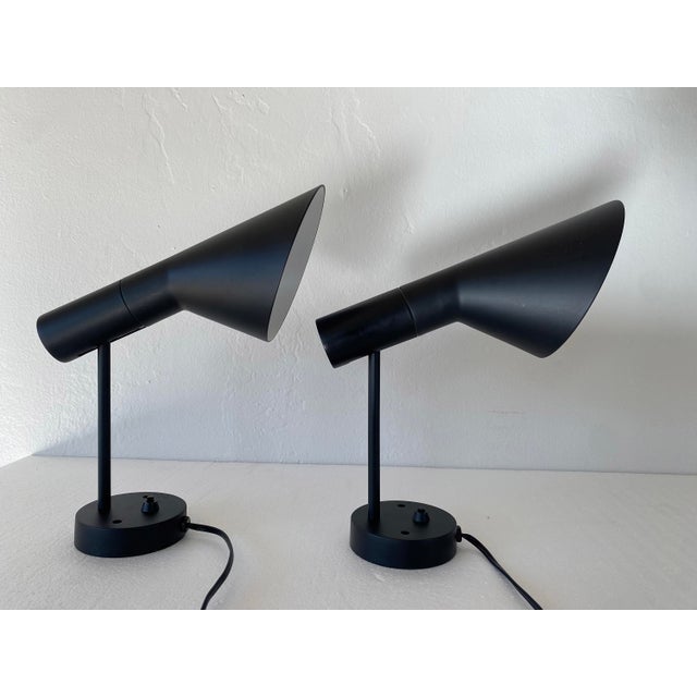 Arne Jacobsen AJ wall sconces for Louis Poulsen. These are made to plug into your wall's outlets but can probably be...